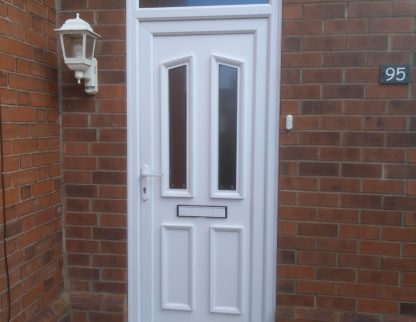 Glazed white Upvc front door with transom window