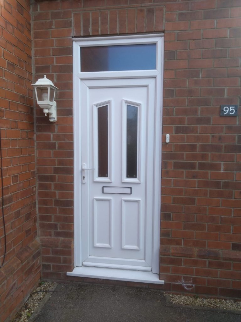 Glazed white Upvc front door with transom window