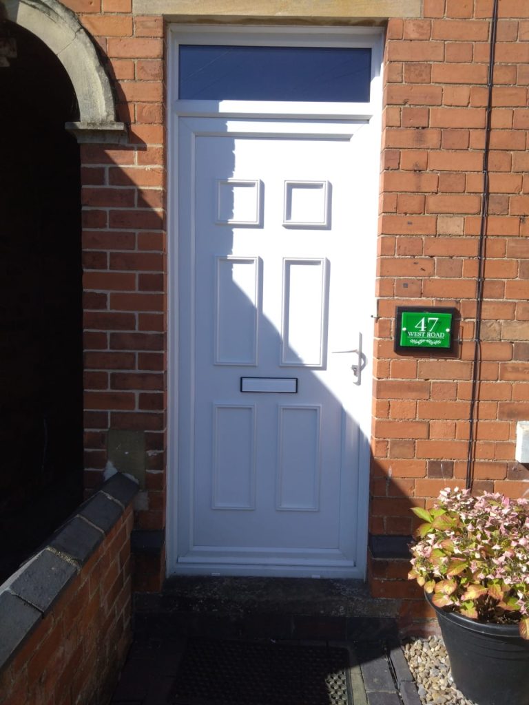 Unglazed Upvc front door in white by Taurus Boston