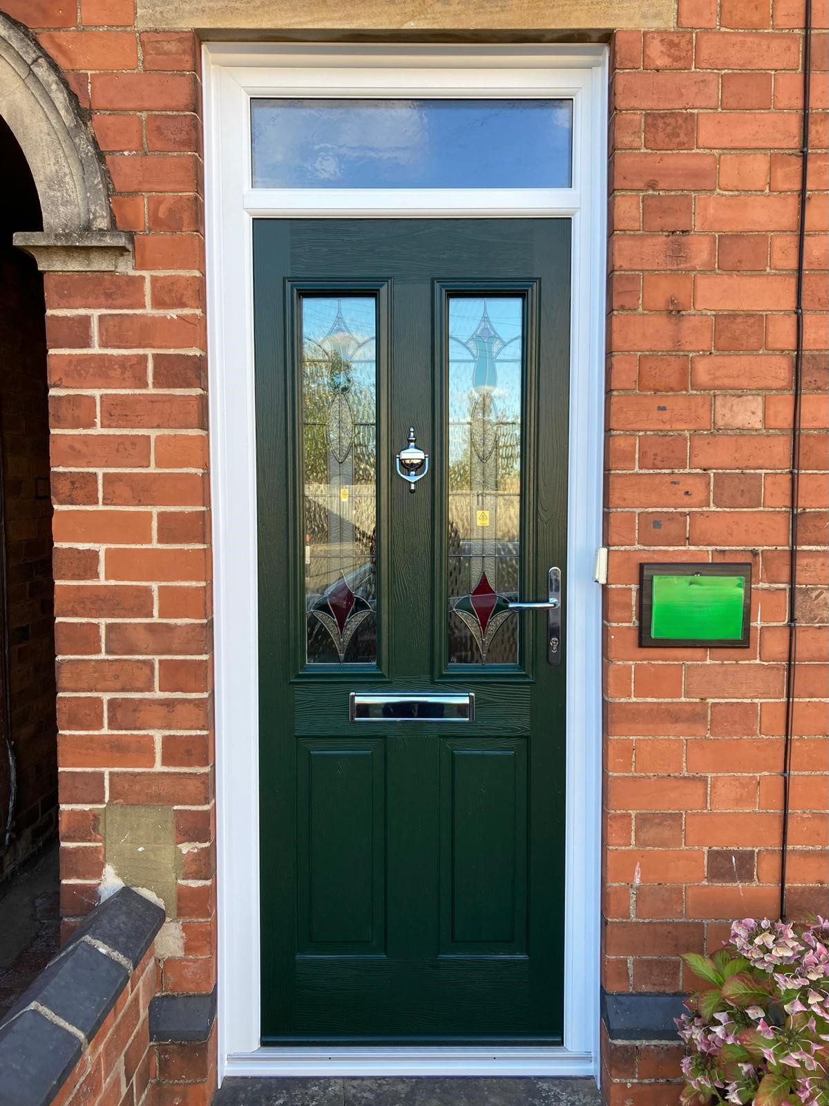 Green composite front door installation in Boston, By Taurus Locks and Glazing.